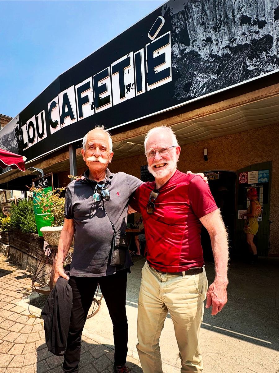 François Guillot and Joel Coquegniot outside the Lou Cafetié sign